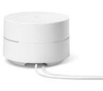 Google WiFi Snow white router connected to its power cable