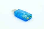 Dynamode blue USB stereo sound card angled view with microphone and headphone sockets